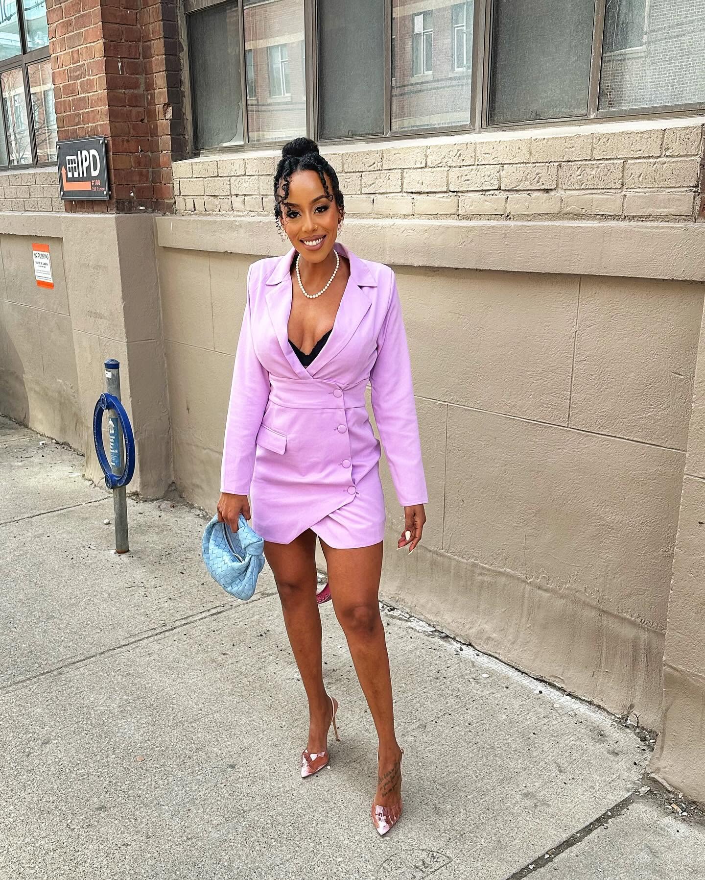 Sewit in her original lilac outfit on a Toronto street